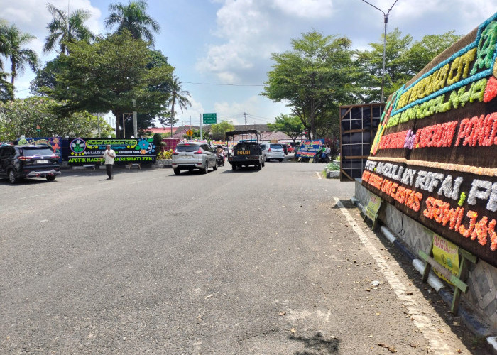 Lautan Karangan Bunga Iringi Kepergian Alex Noerdin