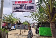 Warga Jakabaring Pasang Baliho Sindir Pemilik Tuyul